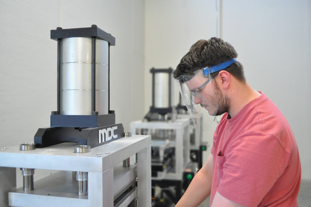 Man working on a machine wearing a DuraShield