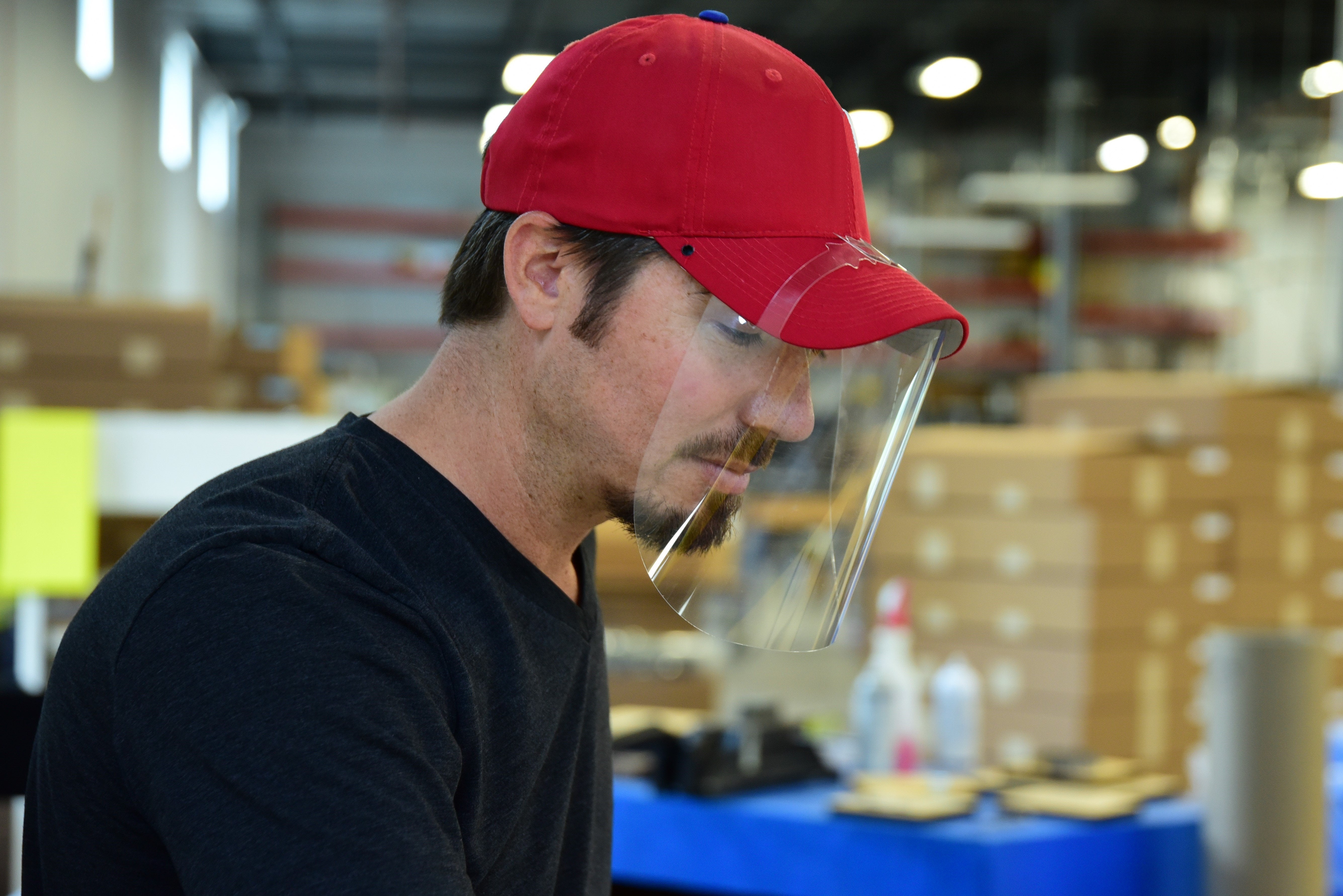 Man wearing a QuickShield in a factory setting